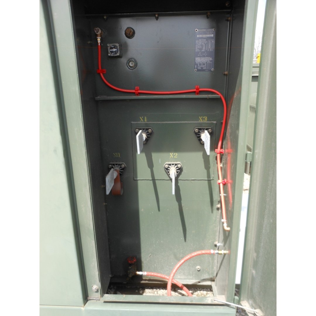Kit 2 - Interior installation with red tubing routed through transformer